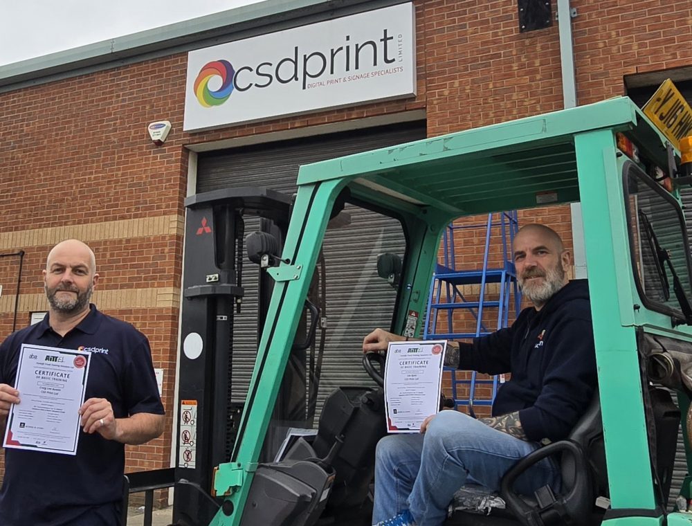 Craig and Lee have passed their fork lift driver proficiency training this image shows them with their certificates